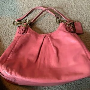 Coach breast cancer awareness purse.